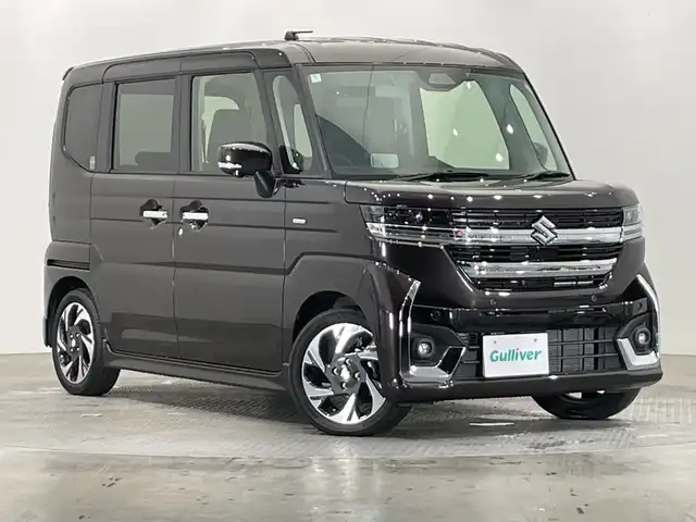 スズキ スペーシア カスタム HYBRID XS 栃木県 2024(令6)年 0.2万km 茶 純正9インチメモリナビ/（フルセグTV/Bluetooth/USB//AppleCarPlay/AndoroidAuto）/全方位カメラ/トヨタセーフティセンス/コーナーセンサー/両側パワースライドドア/ハーフレザーシート/シートヒーター/禁煙車/ステアリングヒーター/ヘッドアップディスプレイ/オートライト/LEDヘッドライト/横滑り防止装置/フォグランプ/スマートキー/プッシュスタート/アイドリングストップ/ステアリングスイッチ/革巻きステアリング/ウィンカーミラー/純正15インチアルミホイール/純正フロアマット