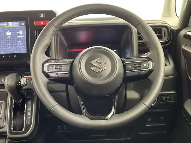スズキ スペーシア カスタム HYBRID XS 栃木県 2024(令6)年 0.2万km 茶 純正9インチメモリナビ/（フルセグTV/Bluetooth/USB//AppleCarPlay/AndoroidAuto）/全方位カメラ/トヨタセーフティセンス/コーナーセンサー/両側パワースライドドア/ハーフレザーシート/シートヒーター/禁煙車/ステアリングヒーター/ヘッドアップディスプレイ/オートライト/LEDヘッドライト/横滑り防止装置/フォグランプ/スマートキー/プッシュスタート/アイドリングストップ/ステアリングスイッチ/革巻きステアリング/ウィンカーミラー/純正15インチアルミホイール/純正フロアマット