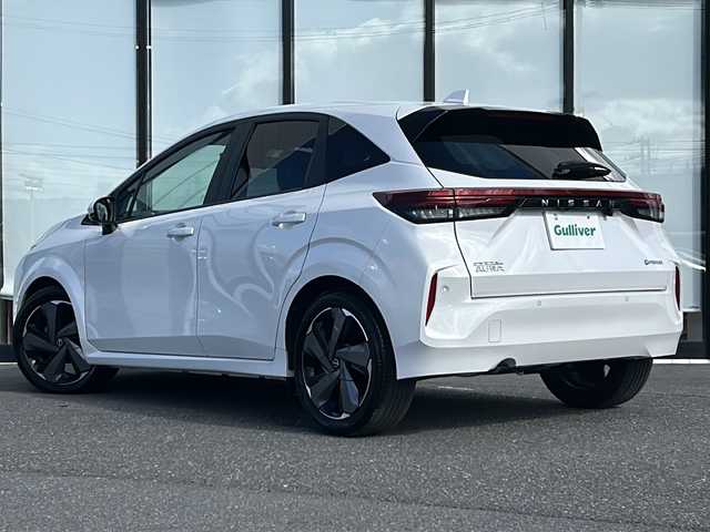 日産 オーラ G レザーエディション 山形県 2022(令4)年 1.6万km ピュアホワイトパール プロパイロット/レーダークルーズコントロール/ブラインドスポットモニター/BOSEプレミアムサウンド/純正ナビ/アラウンドビューモニター/LEDオートライト/オートマチックハイビーム/フォグランプ/レザーシート/純正ドライブレコーダー/デジタルインナーミラー/電動パーキングブレーキ/オートブレーキホールド/ステアリングスイッチ/置くだけ充電/ビルトインETC2.0/純正AW/純正フロアマット/電動格納ウィンカーミラー/スマートキー/ドアバイザー