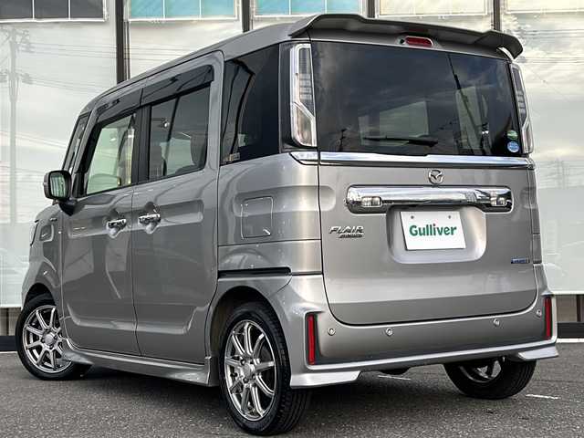 マツダ フレアワゴン カスタムスタイル ハイブリッド XT 山形県 2018(平30)年 7.3万km シルバー 禁煙車/4WD/デュアルセンサーブレーキ/レーンキープアシスト/横滑り防止装置/オートマチックハイビーム/後方コーナーセンサー/バックカメラ/純正SDナビ/（Bluetooth/フルセグ/AM/FM/USB)/テレビキャンセラー/両側パワースライドドア/アイドリングストップ/ステアリングスイッチ/パドルシフト/ハーフレザー/前席シートヒーター/社外フロアマット/社外アルミホイール/電動格納ミラー/ドアバイザー/LEDヘッドライト/フォグランプ/ホイール付きスタッドレスタイヤ車載4本/（155/65/R14)3mm