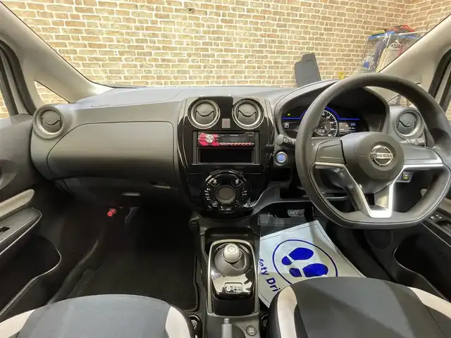 日産 ノート e－パワー B FOUR 岩手県 2021(令3)年 1.5万km ホワイト ４WD　/アラウンドビューモニター/エマージェンシーブレーキ/ETC/インテリジェントルームミラー/コーナーセンサー/横滑り防止装置/レーンアシスト/Pioneerオーディオ/オートライト/オートエアコン/ヘッドライトレベライザー/ハイビームアシスト/プッシュスタート/14インチスチールホイール/純正ホイールキャップ