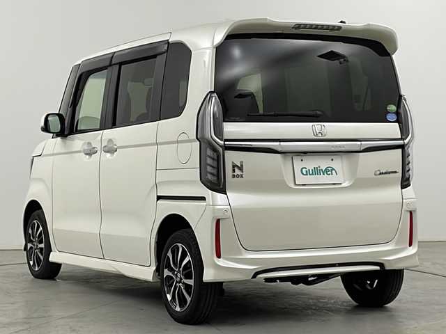 ホンダ Ｎ ＢＯＸ カスタム G L ホンダセンシング 道央・札幌 2017(平29)年 3.2万km プレミアムホワイトパールⅡ ・４WD /Honda SENSING/・衝突軽減ブレーキ/誤発進抑制機能/・後方誤発進抑制機能/路外逸脱抑制機能/・アダプティブ・クルーズ・コントロール〉/・LKAS〈車線維持支援システム〉/・LEDオートライト/オートハイビーム/・社外MDV-Z704 ナビ/・DVD.CD.SD.Bluetooth/・フルセグ/バックカメラ/・両側パワースライドドア/・純正キー一体型エンジンスターター/・スマートキー/スペアキー/・D.N席シートヒーター/ミラーヒーター/・ビルトインETC/・保証書/取扱説明書