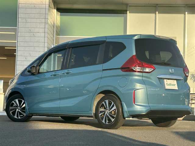 ホンダ フリード＋ ハイブリット EX 兵庫県 2016(平28)年 3.4万km ブルーホライゾンM 純正7インチナビ/フルセグ/BT/前方ドラレコ/ビルトインETC/視点切替式サイドビュー＆バックビューモニター/追従クルーズコントロール/D＋N席シートヒーター/両側パワースライドドア/ステアリングスイッチ/衝突軽減ブレーキ/車線維持システム/フルフラット/ハンズフリー