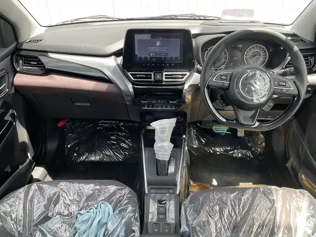 スズキ フロンクス 熊本県 2024(令6)年 0.1万km未満 パール 純正9インチナビ/・AM/FM/BT/SD/・android　auto/・apple　carplay/・フルセグTV/・全周囲カメラ/スズキセーフティサポート/・デュアルセンサーブレーキサポート/・ヘッドアップディスプレイ/・標識認識機能/・誤発進抑制機能/・アダプティブクルーズコントロール/・車線逸脱抑制機能/・ハイビームアシスト/置くだけ充電/電動パーキングブレーキ/・オートホールド/革巻きステアリング/・パドルシフト/・ステアリングスイッチ/ハーフレザーシート/・前席シートヒーター/LEDヘッドライト/純正アルミホイール/電動格納ミラー/・ウインカーミラー/プッシュスタート/スマートキー