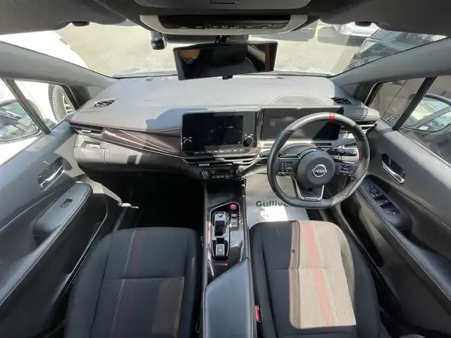 日産 オーラ ニスモ 群馬県 2022(令4)年 5万km ブリリアントシルバー/スーパーブラック 2トーン エマージェンシーブレーキ/プロパイロット/純正9インチメモリナビ/　　BT/フルセグ/USB/HDMI/スマホ連携/アラウンドビューモニター/LEDオートライト/オートハイビーム/ハーフレザーシート/前席シートヒーター/純正17インチAW/コーナーセンサー/ドライブレコーダー/ブラインドスポットモニター/デジタルインナーミラー/おくだけ充電/オートブレーキホールド/ステアリングヒーター/ステアリングスイッチ/横滑り防止装置/サイド・カーテンエアバッグ/スマートキー/ビルトインETC2.0