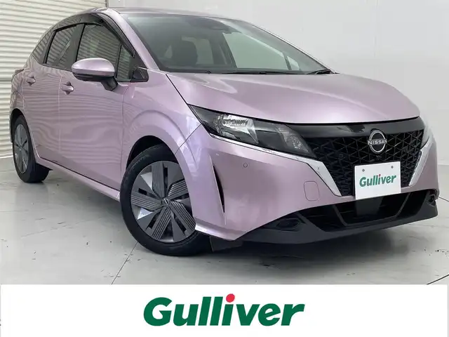 日産 ノート X 茨城県 2022(令4)年 1.4万km ピンク 純正ナビ/Bluetooth/フルセグTV/全方位カメラ/デジタルインナーミラー/ドライブレコーダー/コーナーセンサー/横滑り防止装置/衝突軽減ブレーキ/BSW/カーテンエアバッグ/電格ミラー