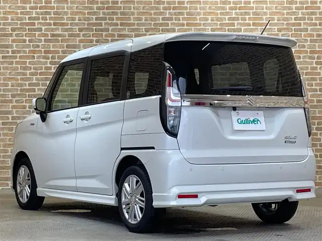 スズキ ソリオ HV MZ 岩手県 2023(令5)年 2.9万km ピュアホワイトP ４WD/両側パワースライドドア/カラーヘッドアップディスプレイ/スズキセーフティサポート/デュアルカメラブレーキサポート/車線逸脱警報/アダプティブクルーズコントロール/標識認識機能/先行車発進お知らせ機能/誤発進抑制機能/リヤパーキングセンサー/横滑り防止装置/アイドリングストップ/スリムサーキュレーター/ロールサンシェード/シートヒーター/KENWOODナビ/バックカメラ/ETC/ドライブレコーダー/LEDヘッドライト/純正15インチアルミホイール