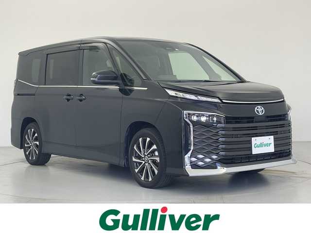 トヨタ ヴォクシー ハイブリッド S－Z 愛知県 2022(令4)年 4万km グリッターブラックガラスフレーク トヨタ純正10.5インチディスプレイオーディオPlus/CD/DVD可/快適利便パッケージHigh/ハンズフリーデュアルパワースライドドア/パワーバックドア/パワーバックドアスイッチ/ナノイーX/バックカメラ/ステアリングヒーター/運転席、助手席シートヒーター/後席シートヒーター/ブラインドスポットモニター/レーンチェンジアシスト/レーダークルーズコントロール/ユニバーサルステップ/プロジェクター式LEDヘッドランプ/HDMI/ETC2.0