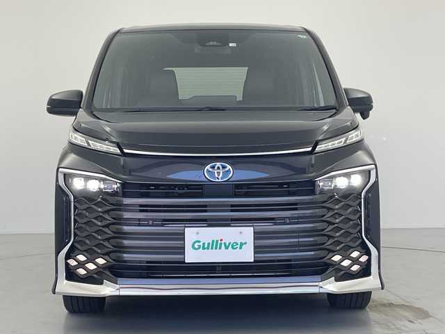 トヨタ ヴォクシー ハイブリッド S－Z 愛知県 2022(令4)年 4万km グリッターブラックガラスフレーク トヨタ純正10.5インチディスプレイオーディオPlus/CD/DVD可/快適利便パッケージHigh/ハンズフリーデュアルパワースライドドア/パワーバックドア/パワーバックドアスイッチ/ナノイーX/バックカメラ/ステアリングヒーター/運転席、助手席シートヒーター/後席シートヒーター/ブラインドスポットモニター/レーンチェンジアシスト/レーダークルーズコントロール/ユニバーサルステップ/プロジェクター式LEDヘッドランプ/HDMI/ETC2.0