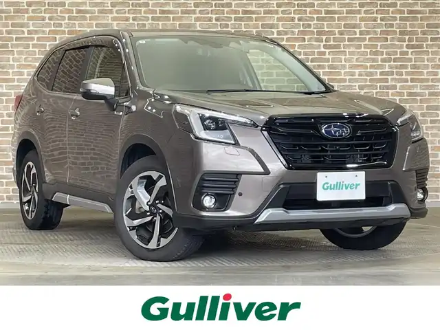 スバル フォレスター ハイブリッド アーバンセレクション 岩手県 2024(令6)年 1.4万km 茶Ｍ ブリリアントブロンズメタリック(UCD)/４WD/アイサイト/アイサイトセイフティプラス/X-MODE/プリクラッシュブレーキ/全車速追従機能付きクルーズコントロール/アクティブレーンキープ/ツーリングアシスト/コーナーセンサー/青信号お知らせ機能/スマートリヤビューミラー/スバルリヤビークルディテクション/ドライバーモニタリングシステム/ステアリング連動ヘッドランプ/エマージェンシーレーンキープ/AT誤発進抑制機能/アダプティブドライビングビーム/パドルシフト/パワーリヤゲート/パワーシート(前席)/シートヒーター(前席・後席左右)/ステアリングヒーター/純正ナビ/フルセグTV/ETC2.０/ドライブレコーダー/LEDヘッドライト/フロント・リヤフォグランプ