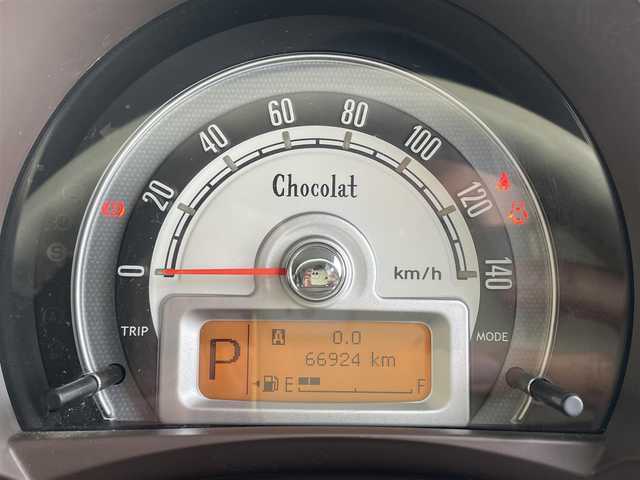 スズキ ラパン ショコラ X 東京都 2014(平26)年 6.7万km ベージュ ナビゲーション　/フルセグテレビ　/ＣＤ＆ＤＶＤ　/ブルートゥース　/バックカメラ　/ＥＴＣ　/アイドリングストップ　/スマートキー　/合革シート　/シートヒーター　/アイドリングストップ　/保証書　/取扱説明書　/整備手帳