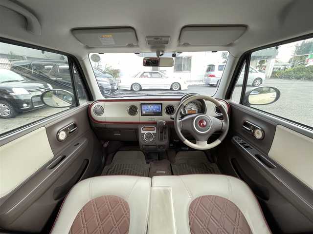 スズキ ラパン ショコラ X 東京都 2014(平26)年 6.7万km ベージュ ナビゲーション　/フルセグテレビ　/ＣＤ＆ＤＶＤ　/ブルートゥース　/バックカメラ　/ＥＴＣ　/アイドリングストップ　/スマートキー　/合革シート　/シートヒーター　/アイドリングストップ　/保証書　/取扱説明書　/整備手帳