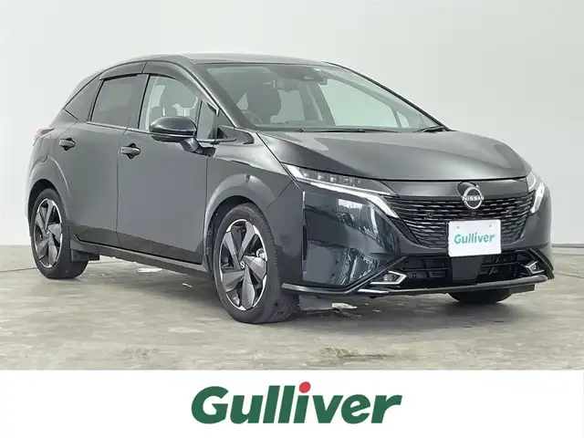 日産 オーラ G レザーエディション 千葉県 2023(令5)年 2.7万km 黒Ｍ 禁煙車/360°セーフティアシスト/・前方衝突予測警報/・車線逸脱防止支援システム/・後側方車両検知警報/・後側方衝突防止支援システム/・後退時衝突防止支援システム/インテリジェントルームミラー/純正9インチナビ/アラウンドビューモニター/LEDオートライト/シートヒーター/レザーシート/純正フロアマット/純正17インチアルミホイール/ステアリングスイッチ/オートエアコン/USBポート/プッシュスタート/スマートキー