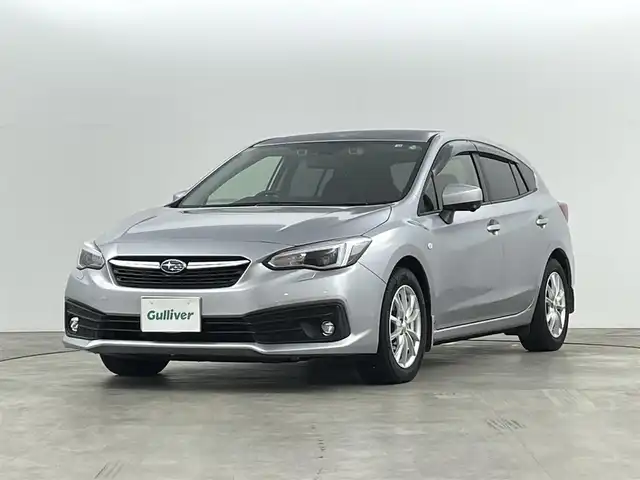 スバル インプレッサ スポーツ 1．6i－Lアイサイト 福島県 2022(令4)年 2.7万km アイスシルバーメタリック アイサイト/・衝突被害軽減ブレーキ/・レーダークルーズコントロール/・車線逸脱警報装置/・後退時自動ブレーキ/社外8インチマルチナビ/・型番：CN-FX810D/・フルセグTV/BT/SD/USB/ブルーレイ再生//CD/DVD/FM/AM/・バックカメラ/・サイドカメラ/・ETC/・前方ドライブレコーダー/電子パーキング/・オートブレーキホールド/ブラインドスポットモニター/革巻きステアリング/・ステアリングリモコン/・ステアリング連動ヘッドランプ/・パドルシフト/プッシュスタート/・スマートキー/電動格納ミラー/LEDヘッドライト/・フォグランプ/・バックフォグ/・オートライト/オートワイパー/アイドリングストップ/純正フロアマット/純正ドアバイザー/社外16インチAW