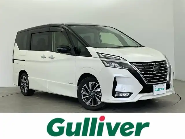 日産 セレナ ハイウェイスター V 富山県 2021(令3)年 5.9万km ブリリアントホワイトパール 2トーン 純正10型ナビ（AM/FM/BT/DVD/フルセグ）/全方位カメラ/純正11型後席モニター/ドライブレコーダー/ETC/両側パワースライドドア/ブラインドスポットモニター/衝突被害軽減システム/レーダークルーズコントロール/レーンキープアシスト/コーナーセンサー/横滑り防止装置/アイドリングストップ/デジタルインナーミラー/オートホールド付電子パーキング/純正アルミホイール/純正フロアマット/オートLEDライト/スマートキー/スペアキー