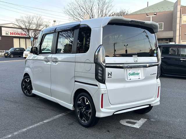 ホンダ Ｎ ＢＯＸ カスタム G L ターボ ホンダセンシング 鳥取県 2018(平30)年 5.2万km プラチナホワイトパール ホンダセンシング/・衝突軽減ブレーキ/・前後誤発信抑制機能/・歩行者事故低減ステアリング/・路外逸脱抑制機能/・アダプティブクルーズコントロール/・車線維持支援システム/・オートハイビーム/・先行車発進お知らせ機能/・標識認識機能/Gathers8型ナビ【VXU-185NBi】/・フルセグ/Bluetooth/CD/DVD/バックカメラ/前方ドライブレコーダー/スマートキー/プッシュスタート/ビルトインETC/ハーフレザーシート/両側電動スライドドア/純正15AW/LEDヘッドライト/LEDフォグ/オートライト/W＆サイドエアバック/カーテンエアバック