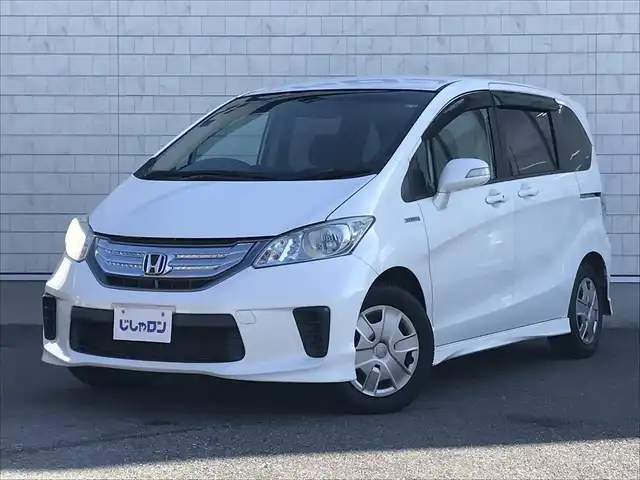 ホンダ フリード ハイブリット ジャストセレクション 栃木県 2013(平25)年 7.4万km ホワイトオーキッドパール (株)IDOMが運営する【じしゃロン小山店】の自社ローン対象車両になります。こちらは現金ご利用時の価格です。/自社ローンご希望の方は別途その旨お申付け下さい。//禁煙車/純正ワンセグナビ/（CD/DVD/AM/FMラジオ）/スマートキー/バックカメラ/ＥＴＣ/両側パワースライドドア/クルーズコントロール/ステアリングリモコン/電動格納ドアミラー/パワーウインドウ/防眩ミラー