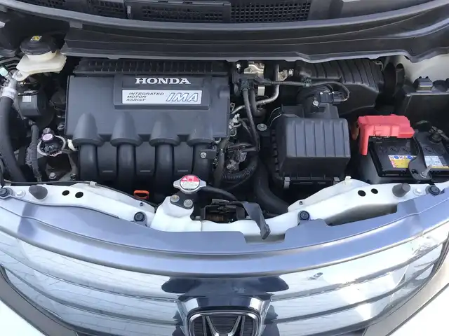 ホンダ フリード ハイブリット ジャストセレクション 栃木県 2013(平25)年 7.4万km ホワイトオーキッドパール (株)IDOMが運営する【じしゃロン小山店】の自社ローン対象車両になります。こちらは現金ご利用時の価格です。/自社ローンご希望の方は別途その旨お申付け下さい。//禁煙車/純正ワンセグナビ/（CD/DVD/AM/FMラジオ）/スマートキー/バックカメラ/ＥＴＣ/両側パワースライドドア/クルーズコントロール/ステアリングリモコン/電動格納ドアミラー/パワーウインドウ/防眩ミラー