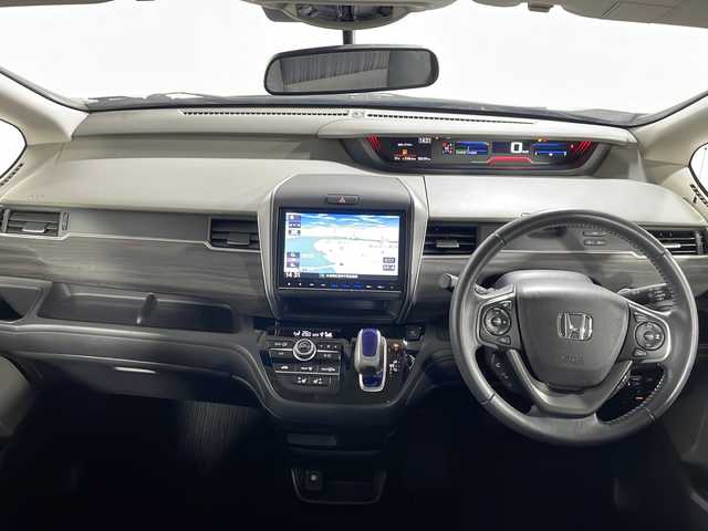 ホンダ フリード ハイブリット EX 広島県 2017(平29)年 5.4万km コバルトブルーパール 純正９型ナビ　/両側パワースライドドア　/シートヒーター　/レーダークルーズコントロール　/バックカメラ　/フルセグTV　/オートライト　/レーンキープアシスト　/衝突軽減　/LEDヘッドランプ　/スマートキー　/ETC　/純正15インチアルミホイール(185/65/R15)/エアバック（運転席/助手席/サイド/カーテン）