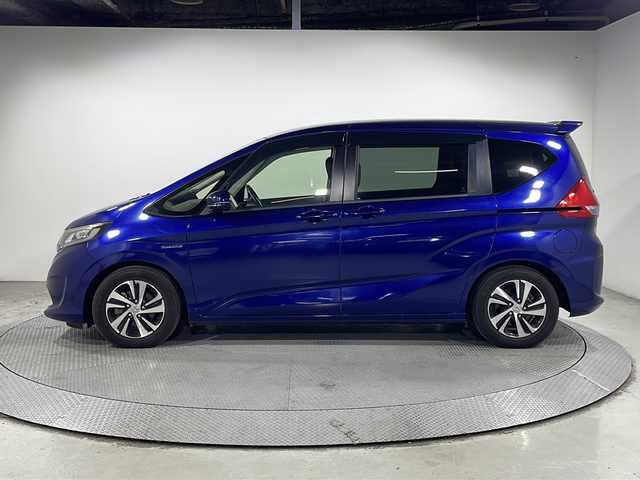 ホンダ フリード ハイブリット EX 広島県 2017(平29)年 5.4万km コバルトブルーパール 純正９型ナビ　/両側パワースライドドア　/シートヒーター　/レーダークルーズコントロール　/バックカメラ　/フルセグTV　/オートライト　/レーンキープアシスト　/衝突軽減　/LEDヘッドランプ　/スマートキー　/ETC　/純正15インチアルミホイール(185/65/R15)/エアバック（運転席/助手席/サイド/カーテン）