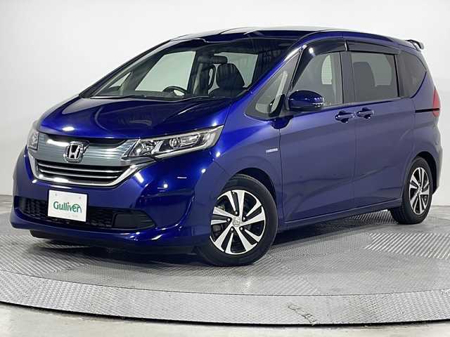 ホンダ フリード ハイブリット EX 広島県 2017(平29)年 5.4万km コバルトブルーパール 純正９型ナビ　/両側パワースライドドア　/シートヒーター　/レーダークルーズコントロール　/バックカメラ　/フルセグTV　/オートライト　/レーンキープアシスト　/衝突軽減　/LEDヘッドランプ　/スマートキー　/ETC　/純正15インチアルミホイール(185/65/R15)/エアバック（運転席/助手席/サイド/カーテン）