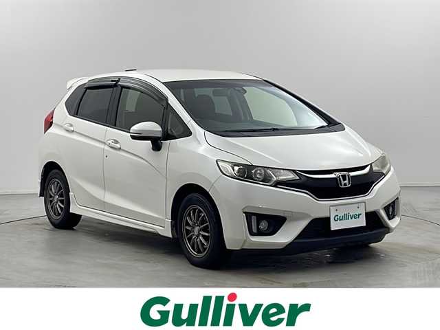 ホンダ フィット 13G Sパッケージ 栃木県 2015(平27)年 15.9万km プレミアムホワイトパールⅡ シティブレーキアシスト/純正ナビ/　フルセグ/CD/DVD/AM/FM/SD/BT/バックカメラ/オートライト/フォグランプ/電格ウィンカーミラー/クルーズコントロール/ステアリングスイッチ/パドルシフト/ドライブレコーダー/プッシュスタート/スマートスペアキー/純正リヤスポイラー/純正15インチAW付185/60夏タイヤ車載