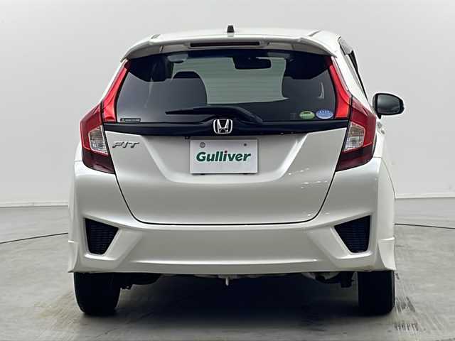 ホンダ フィット 13G Sパッケージ 栃木県 2015(平27)年 15.9万km プレミアムホワイトパールⅡ シティブレーキアシスト/純正ナビ/　フルセグ/CD/DVD/AM/FM/SD/BT/バックカメラ/オートライト/フォグランプ/電格ウィンカーミラー/クルーズコントロール/ステアリングスイッチ/パドルシフト/ドライブレコーダー/プッシュスタート/スマートスペアキー/純正リヤスポイラー/純正15インチAW付185/60夏タイヤ車載