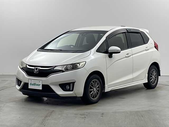 ホンダ フィット 13G Sパッケージ 栃木県 2015(平27)年 15.9万km プレミアムホワイトパールⅡ シティブレーキアシスト/純正ナビ/　フルセグ/CD/DVD/AM/FM/SD/BT/バックカメラ/オートライト/フォグランプ/電格ウィンカーミラー/クルーズコントロール/ステアリングスイッチ/パドルシフト/ドライブレコーダー/プッシュスタート/スマートスペアキー/純正リヤスポイラー/純正15インチAW付185/60夏タイヤ車載