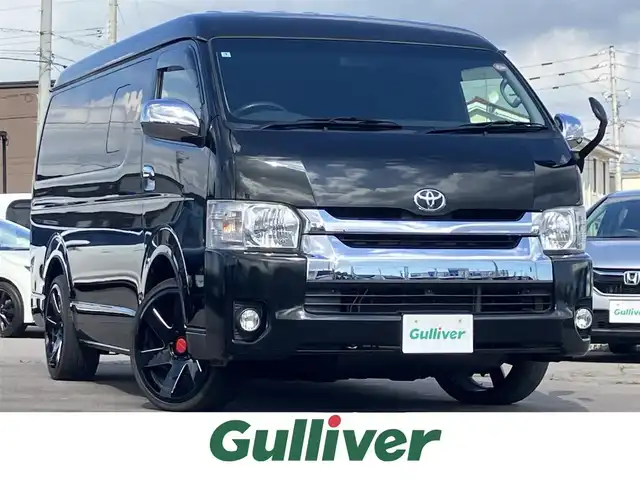 トヨタ ハイエース GL 道南・函館 2015(平27)年 6.3万km ブラックマイカ ・４WD/・社外20インチアルミ/・純正ディーラーOPナビ/・Bluetooth/・DVD.CD.フルセグTV．SD/・社外フリップダウンモニター/・バックカメラ/・左パワースライドドア/・LEDライト/・オートライト/・社外シートカバー/・社外シフトノブ/・社外コンソールボックス/・リアヒーター・リアエアコン/・キーレス