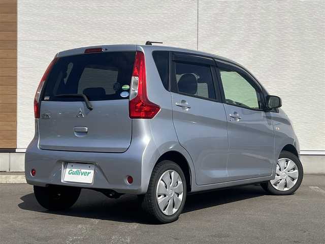 三菱 ｅＫワゴン M e－アシスト 秋田県 2017(平29)年 2.9万km クールシルバーメタリック 社外ナビ/衝突軽減システム/４WD/リモコンキー/運転席シートヒーター/アイドリングストップ/社外フロアマット/純正ドアバイザー/ETC/オートエアコン/パワーステアリング/パワーウィンドウ/横滑り防止/レベライザー/電動格納ミラー/保証書/取扱説明書/記録簿
