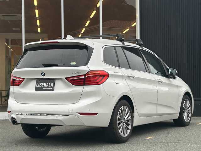 ＢＭＷ ２１８ｉ グランツアラー ラグジュアリー 福岡県 2018(平30)年 7万km ミネラルホワイト インテリジェントセーフティ/黒革シート/シートヒーター/ＴＨＵＬＥルーフキャリア/純正ナビ/バックカメラ/ブルートゥース/ＬＥＤライト/オートライト/オートワイパー/パワーバックドア/Ｆ／Ｒフォグランプ/ステアリングスイッチ/純正１７インチＡＷ/ミラー一体型ＥＴＣ