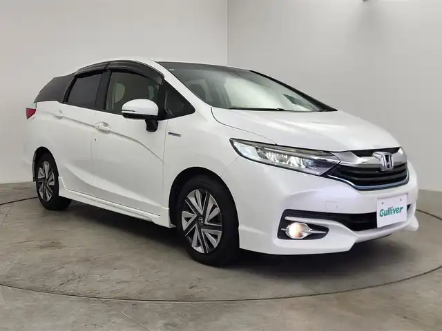 ホンダ シャトル ハイブリッド X スタイルエディション 愛知県 2016(平28)年 7.6万km ホワイトオーキッドパール あんしんパッケージ/　　・シティブレーキアクティブシステム/ストラーダ7インチナビ/バックカメラ/ドライブレコーダー/革巻きステアリング/クルーズコントロール/ハーフレザーシート/ビルトインETC/純正LEDヘッドライト/フォグランプ/取扱説明書