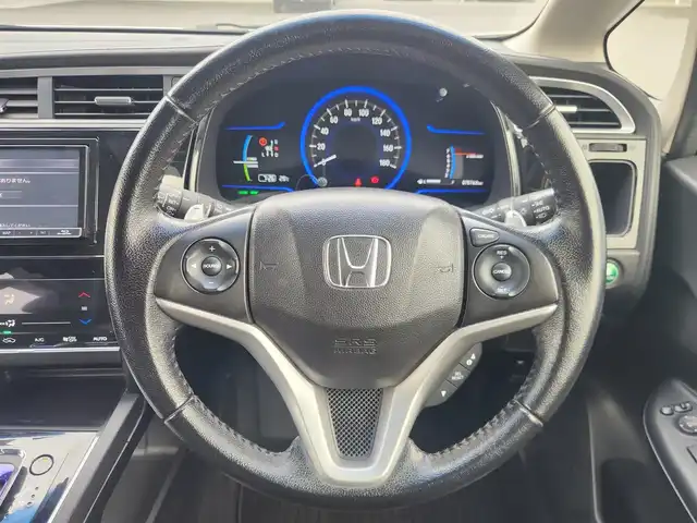 ホンダ シャトル ハイブリッド X スタイルエディション 愛知県 2016(平28)年 7.6万km ホワイトオーキッドパール あんしんパッケージ/　　・シティブレーキアクティブシステム/ストラーダ7インチナビ/バックカメラ/ドライブレコーダー/革巻きステアリング/クルーズコントロール/ハーフレザーシート/ビルトインETC/純正LEDヘッドライト/フォグランプ/取扱説明書