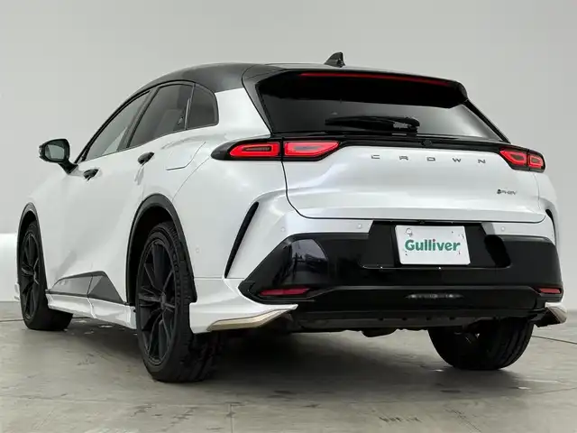 トヨタ クラウン スポーツ RS 愛知県 2024(令6)年 1.5万km パールⅡ 4WD/トヨタチームメイト/　　・アドバンストパーク/　　・パーキングサポートブレーキ/トヨタセーフティセンス/　　・プリクラッシュセーフティ/　　・レーントレーシングアシスト/　　・レーンディバーチャーアラート/　　・レーダークルーズコントロール/　　・アダプティブハイビーム/　　・プロアクティブドライビングアシスト/ブラインドスポットモニター/モデリスタエアロ/　　・フロントスポイラー/　　・サイドスカート/　　・リヤスパッツ/パノラマルーフ/デジタルインナーミラー/ヘッドアップディスプレイ/純正12.3インチナビ/　　BT/フルセグ/パノラミックビューモニター/ドライブレコーダー/ビルトインETC2.0/置くだけ充電/AC100V/革巻きステアリング/ステアリングリモコン/パドルシフト/本革シート/パワーシート/シートポジションメモリ機能/シートヒーター/ベンチレーション/純正LEDヘッドライト/フォグランプ/純正21インチアルミホイール