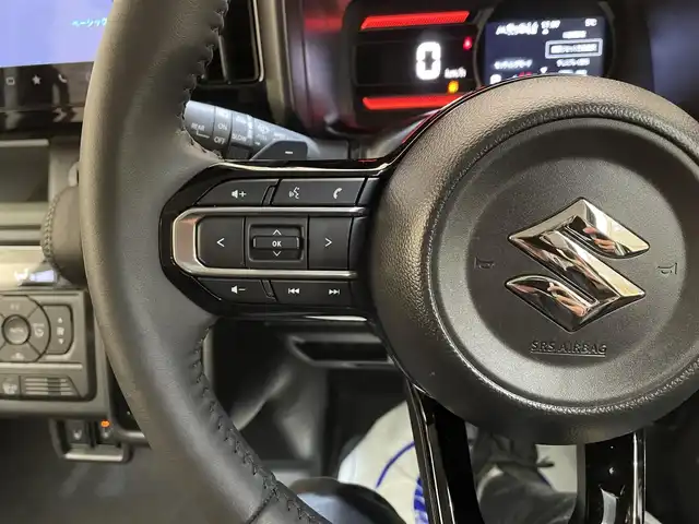 スズキ スペーシア ギア 岩手県 2024(令6)年 0.6万km ブルーイッシュブラックパール3 ４WD/パドルシフト/ターボ/全周囲カメラ/ヘッドアップディスプレイ/両側パワースライドドア/デュアルセンサーブレーキサポート/レーンアシスト/先行車発進告知機能/クルーズコントロール/横滑り防止装置/アイドリングストップ/オートライト/オートハイビーム/ETC/ステアリングヒーター/シートヒーター/純正ナビ/純正１４インチアルミホイール/フルセグTV/ルーフレール