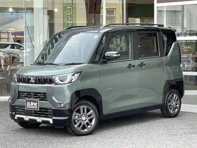 三菱 デリカミニ T プレミアム 福島県 2024(令6)年 0.1万km未満 緑Ｍ ・ルーフレール/・４WDターボ/・デジタルルームミラー/・アラウンドモニター付き/・LEDヘッドライト/・レーンキープアシスト/・両側パワースライドドア/・ハンズフリーオートスライドドア/・衝突軽減ブレーキ/・前席シートヒーター/・レーダークルーズコントロール