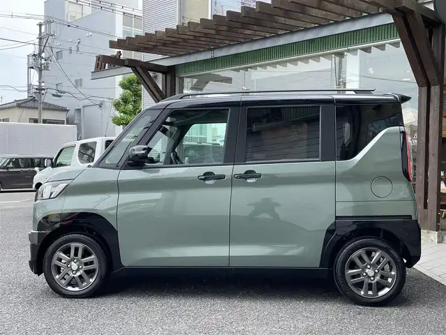 三菱 デリカミニ T プレミアム 福島県 2024(令6)年 0.1万km未満 緑Ｍ ・ルーフレール/・４WDターボ/・デジタルルームミラー/・アラウンドモニター付き/・LEDヘッドライト/・レーンキープアシスト/・両側パワースライドドア/・ハンズフリーオートスライドドア/・衝突軽減ブレーキ/・前席シートヒーター/・レーダークルーズコントロール