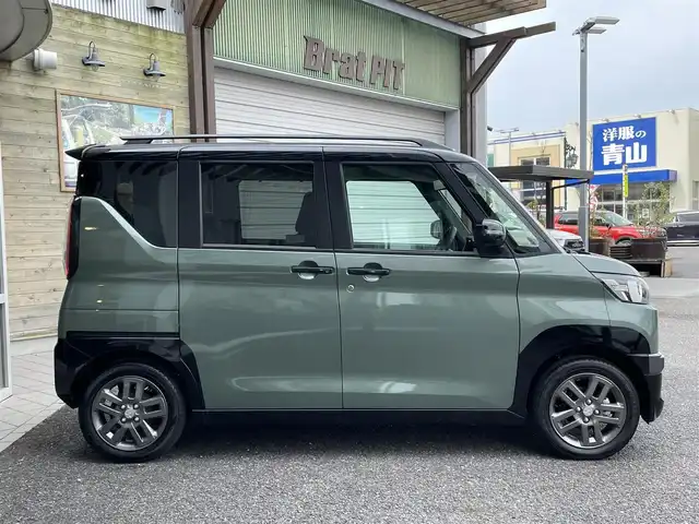 三菱 デリカミニ T プレミアム 福島県 2024(令6)年 0.1万km未満 緑Ｍ ・ルーフレール/・４WDターボ/・デジタルルームミラー/・アラウンドモニター付き/・LEDヘッドライト/・レーンキープアシスト/・両側パワースライドドア/・ハンズフリーオートスライドドア/・衝突軽減ブレーキ/・前席シートヒーター/・レーダークルーズコントロール