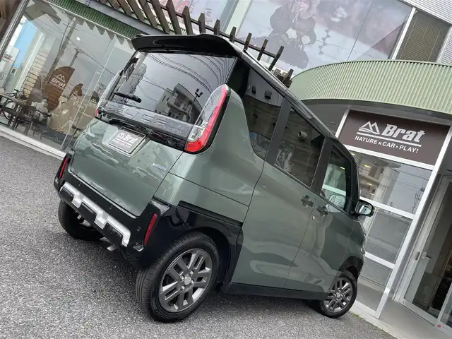 三菱 デリカミニ T プレミアム 福島県 2024(令6)年 0.1万km未満 緑Ｍ ・ルーフレール/・４WDターボ/・デジタルルームミラー/・アラウンドモニター付き/・LEDヘッドライト/・レーンキープアシスト/・両側パワースライドドア/・ハンズフリーオートスライドドア/・衝突軽減ブレーキ/・前席シートヒーター/・レーダークルーズコントロール