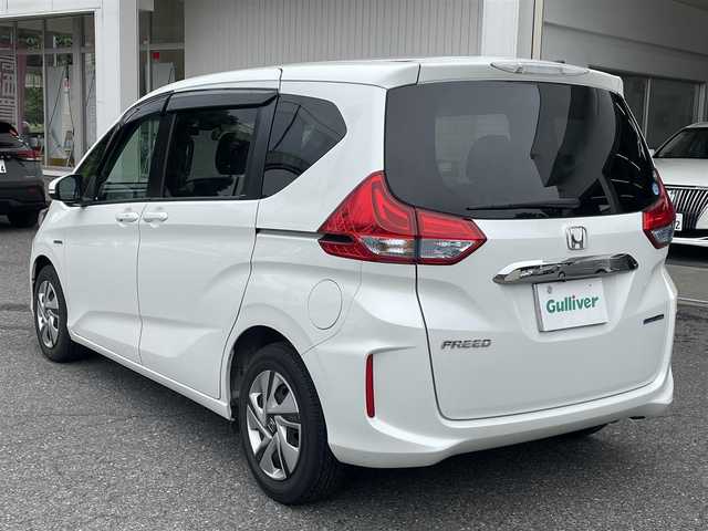 ホンダ フリード ハイブリット G ホンダセンシング 千葉県 2019(平31)年 5.2万km ホワイトオーキッドパール ワンオーナー/純正メモリナビ/9インチ/フルセグ/Bluetooth/SD/フリップダウンモニター11.6インチ/プッシュスタート/社外ドラレコ前後/ETC/オートライト/電動格納ミラー/レーダークルーズコントロール