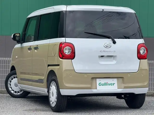ダイハツ ムーヴ キャンバス ストライプス G 千葉県 2024(令6)年 0.1万km未満 シャイニングホワイトパール/サンドベージュメタリック 純正ナビ（NMZK-W73D）/　（BT/DVD/CD/AM/FM)/両側パワースライドドア/バックカメラ/前席　シートヒーター/保温機能付きカップホルダー/スマートアシスト/　・衝突回避支援/　・車線逸脱警報/　・コーナーセンサー/　・オートハイビーム/スペアキー/取扱説明書/保証書