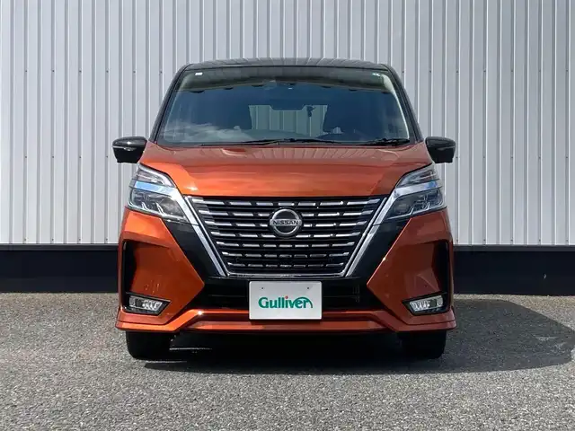 日産 セレナ ハイウェイスター V 千葉県 2021(令3)年 2.2万km サンライズオレンジ/ダイヤモンドブラック 純正10ナビ/（フルセグTV CD DVD BT FM AM）/全周囲カメラ/プロパイロット/デジタルインナーミラー/衝突被害軽減システム/車線逸脱警報/クルーズコントロール/両側パワースライドドア/ETC/ドライブレコーダー/アイドリングストップ/LEDヘッドライト/フォグランプ/オートライト/ウィンカーミラー/電動格納ミラー/純正16インチAW/シートリフター/プッシュスタート/スマートキー/フロアマット/ドアバイザー/スペアキー/取扱説明書/保証書”