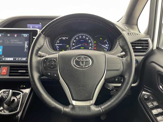 トヨタ エスクァイア ハイブリッド Gi プレミアムパッケージ ブラックテーラード 千葉県 2019(令1)年 6.2万km ホワイトパールクリスタルシャイン 純正ナビ/Bluetooth CD DVD フルセグ/ＥＴＣ/フリップダウンモニター/ドライブレコーダー/バックカメラ/シートヒーター/両側パワースライドドア/純正アルミホイール/純正フロアマット/クルーズコントロール/アイドリングストップ/トヨタセーフティーセンス/プリクラッシュセーフティー/レーンディパーチャーアラート/クリアランスソナー/オートハイビーム/スペアキー/プッシュスタート/スマートキー/ウィンカーミラー/フォグランプ/電動格納ミラー/LEDヘッドライト