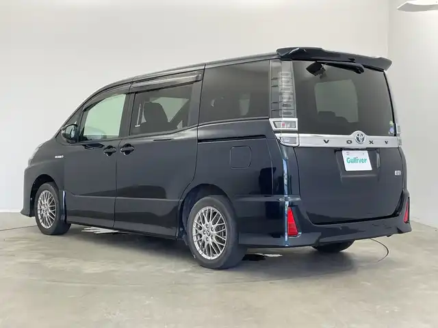 トヨタ ヴォクシー ハイブリッド ZS 新潟県 2019(令1)年 3.7万km ブラッキッシュアゲハガラスフレーク 純正9インチナビ/CD DVD BT フルセグTV/バックカメラ/片側パワースライドドア/ETC/クルーズコントロール/シートヒーター/トヨタセーフティセンス/PCS/LKA/オートハイビーム/LEDヘッドライト