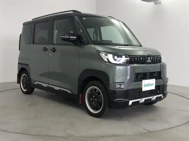 三菱 デリカミニ T プレミアム 愛知県 2023(令5)年 1.8万km 緑 ４ＷＤ/e-assist/・衝突軽減/・踏み間違え/・ロードサイン/・先行発進警告装置/・レーンディパラーチャー/・アダプティブクルーズコントロール/純正ディスプレイオーディオ/・Bluetooth/・Applecarplay/・androidauto/・HDMI/シートヒーター/両側パワースライド/パドルシフト/デジタルインナーミラー/ステアリングヒーター/前後ドライブレコーダー/LANDFOOTアルミホイール/マットガード