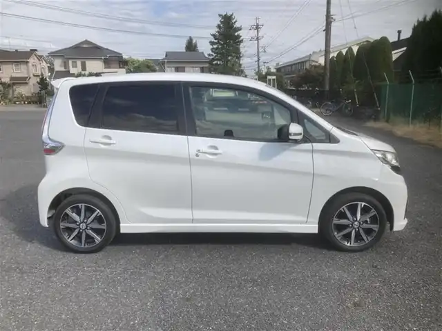 日産 デイズ ハイウェイスターG ターボ 埼玉県 2015(平27)年 9.8万km ホワイトパール (株)IDOMが運営する【じしゃロン鳩ヶ谷店】の自社ローン対象車両になります。こちらは現金ご利用時の価格です。自社ローンご希望の方は別途その旨お申付け下さい。/登録時97202km/純正SDナビ(品番:MC315D-W)/フルセグTV/全周囲カメラ/アイドリングストップ/プッシュスタート/ETC/スマートキー/スペアキー1本/フロントドライブレコーダー/純正フロアマット/純正15インチAW/横滑り防止システム/衝突被害軽減システム/オートハイビーム/オートライト/ベンチシート