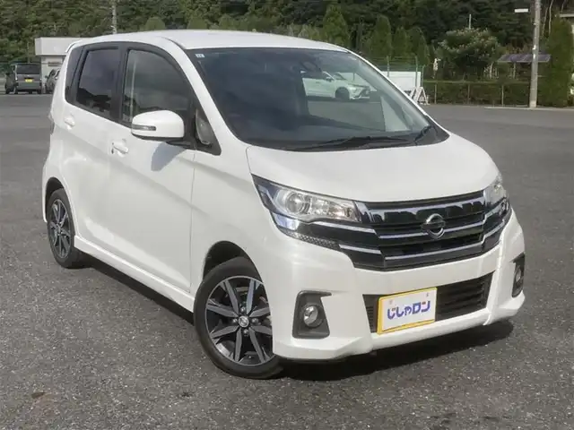 日産 デイズ ハイウェイスターG ターボ 埼玉県 2015(平27)年 9.8万km ホワイトパール (株)IDOMが運営する【じしゃロン鳩ヶ谷店】の自社ローン対象車両になります。こちらは現金ご利用時の価格です。自社ローンご希望の方は別途その旨お申付け下さい。/登録時97202km/純正SDナビ(品番:MC315D-W)/フルセグTV/全周囲カメラ/アイドリングストップ/プッシュスタート/ETC/スマートキー/スペアキー1本/フロントドライブレコーダー/純正フロアマット/純正15インチAW/横滑り防止システム/衝突被害軽減システム/オートハイビーム/オートライト/ベンチシート