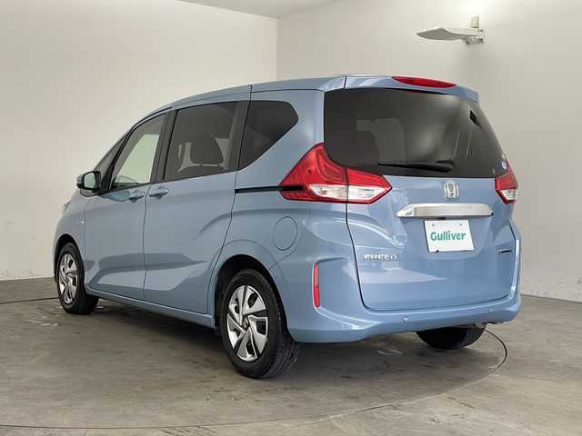 ホンダ フリード ハイブリット G ホンダセンシング 兵庫県 2020(令2)年 4.8万km シーグラスブルーパール ・純正ナビ/Bluetooth/CD/DVD/USB/・バックカメラ/・ホンダセンシング/・衝突軽減ブレーキ/・レーンディバーチャーアラート/・レーンキープアシスト/・レーダークルーズコントロール/・横滑り防止装置/・コーナーセンサー/・両側パワースライドドア/・ステアリングリモコン/・オートワイパー/・純正フロアマット/・シートヒーター/・ロールサンシェード/・LEDヘッドライト/・W＋サイドエアバッグ/・純正前方ドライブレコーダー/・ビルトインETC/・プッシュスタートボタン/・スマートキー/・スペアキー