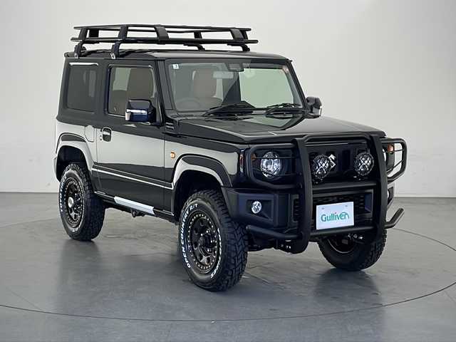 スズキ ジムニー XC 長野県 2025(令7)年 0.1万km未満 ブルーイッシュブラックパール3 4WD/大型グリルガード/LEDフォグ×２個/ルーフラック/リアラダー/1.5インチリフトアップキット（純正車内積載）/ブラウンキルティングレザーシートカバー/スペアタイヤハードカバー/METAL　ROCK１６インチビートリングホイール/TOYO　OPEN　COUNTRY　(185/85R/16)/クリアランスソナー/衝突被害軽減システム/レーンキープアシスト/LEDヘッドライト/シートヒーター（前席）/スマートキー/保証書/取扱説明書