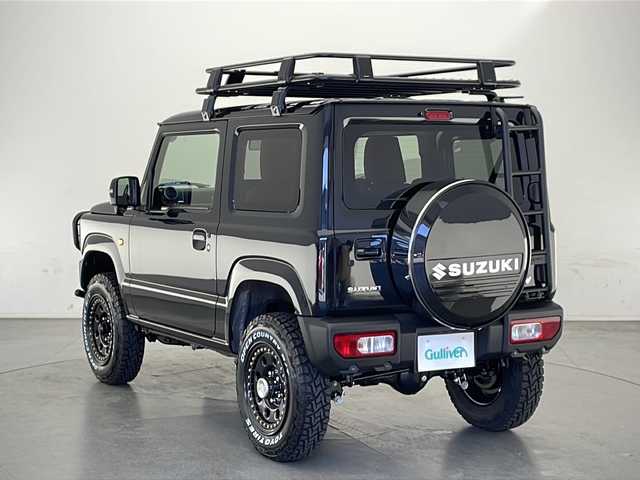 スズキ ジムニー XC 長野県 2025(令7)年 0.1万km未満 ブルーイッシュブラックパール3 4WD/大型グリルガード/LEDフォグ×２個/ルーフラック/リアラダー/1.5インチリフトアップキット（純正車内積載）/ブラウンキルティングレザーシートカバー/スペアタイヤハードカバー/METAL　ROCK１６インチビートリングホイール/TOYO　OPEN　COUNTRY　(185/85R/16)/クリアランスソナー/衝突被害軽減システム/レーンキープアシスト/LEDヘッドライト/シートヒーター（前席）/スマートキー/保証書/取扱説明書